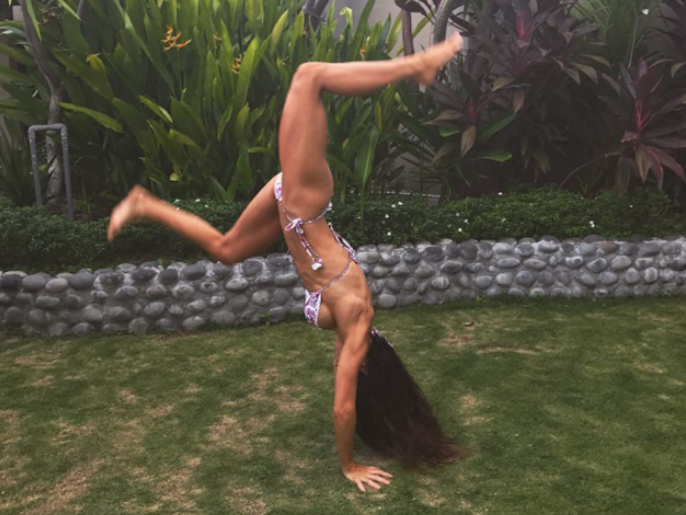 Sophie Guidolin in Bali doing a back flip|